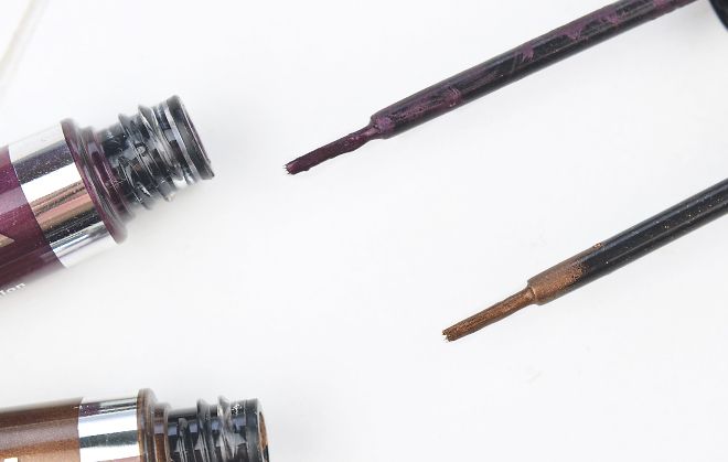 essence liquid ink eyeliner edgy plum bronzy
