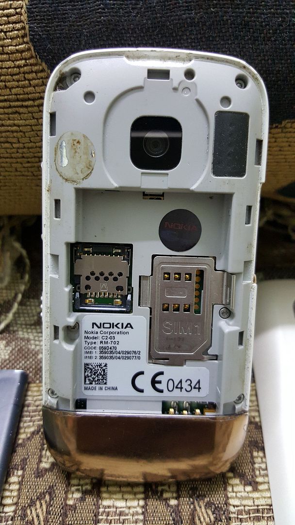 xác Nokia C2-03 / Thẻ nhớ Micro SD 64gb + 32gb / củ sạc zin ipad / ốp lưng + viền nhôm Galaxy Note 3 - 3